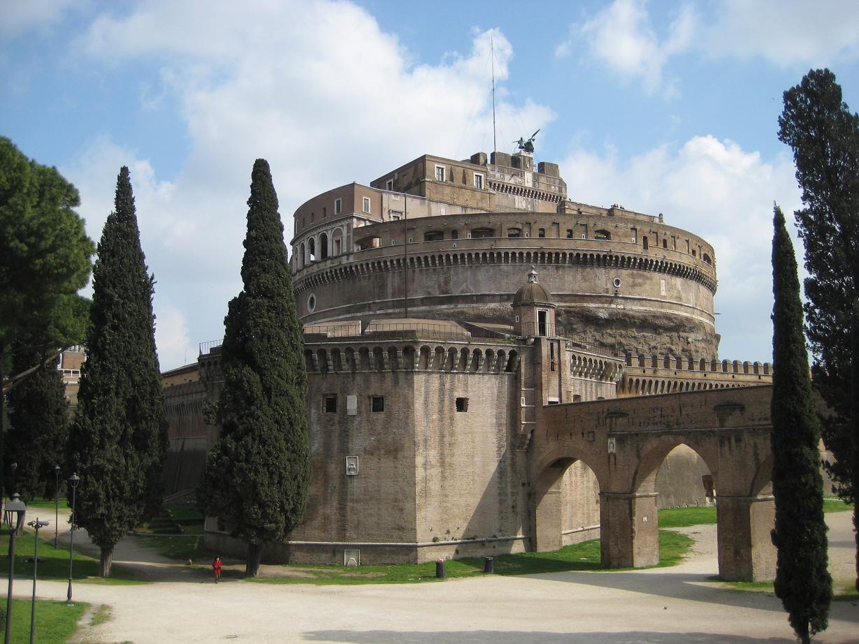 Site in Rome: Mausoleum of Hadrian (from the rear) on the west side of the tiber. It is now called the castello San Angelo and was used as a residence by some popes. A few artifacts remain in the vatican Museum.