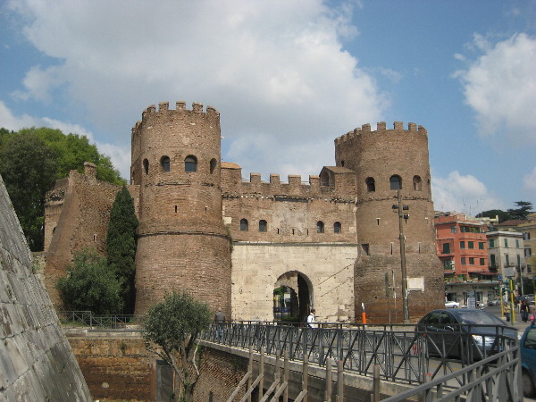 Site in Rome: Porta Ostiense in the Aurelian Walls now known as Porta San Paolo right next to the Pyramid of Cestius.
