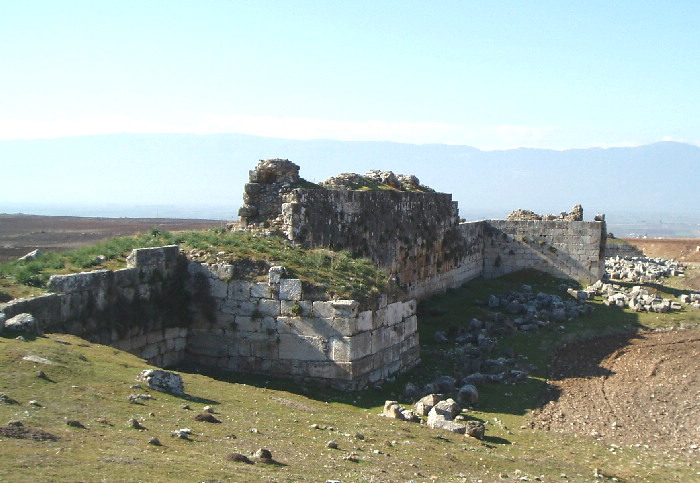 City dating back to the Seleucid era with 2 Km long collonade, temples and agora. Here the Town Wall.