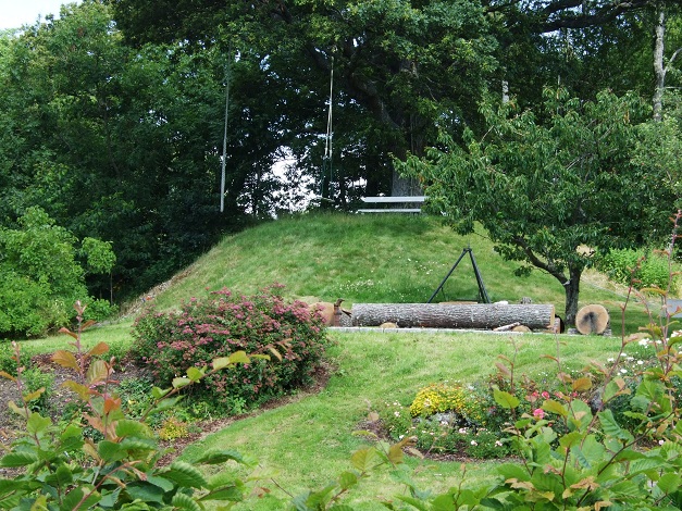 Inside another private garden is a beautiful round barrow.

