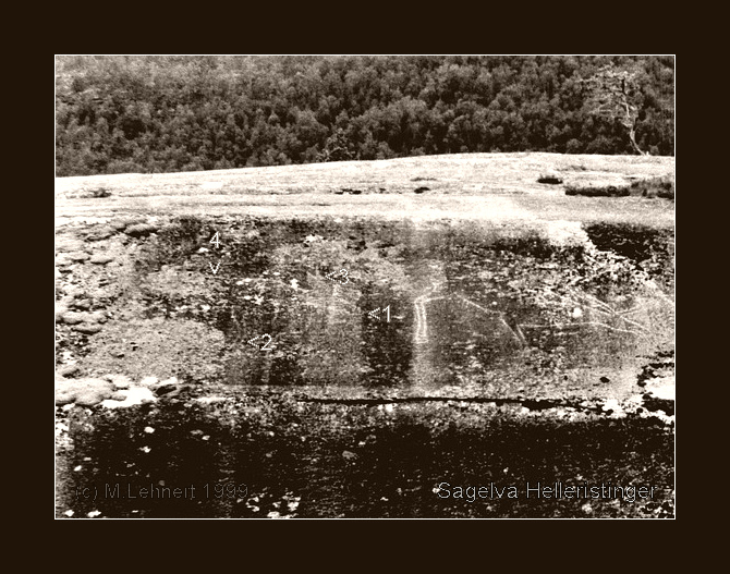 7000-8000 BP. Two larger than life-sized carvings of reindeer. Measuring [1]  2,77m (right one) and 2,34m (left). 
The carvings are almost inaccessible, but can be  seen from other side of the river.  
Near the carvings the riverside is a  4m vertical rock face followed by a steep slope of  60° where the carvings are located. 
The left reindeer is partly weathered/overgrown and often overlooke