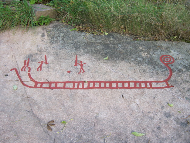 A ship with sword bearing men confronting one another.  September 2011.