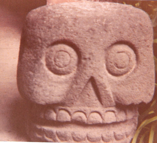 Carved Skull from lapidarium.
Charming little double Pyramid/temple just North of Mexico City.
It is also called Santa Cecilia Pyramid.
There is a small museum/Lapidarium

Scan of picture from 1982. Things might have changed since then, but the pyramid is still visible on Google Earth.