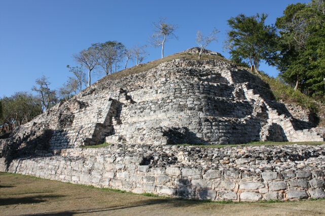 The Itzamatul temple pyramid.
This is another of the great structures of the ancient plaza of Izamal.  Three construction phases have been identified with it: the first building was the base graded with a stairway on each of its sides.  Its bodies have a slight slant and its corners were rounded.  It was constructed around 600 CE.
The second building completely covered the earlier one causing th