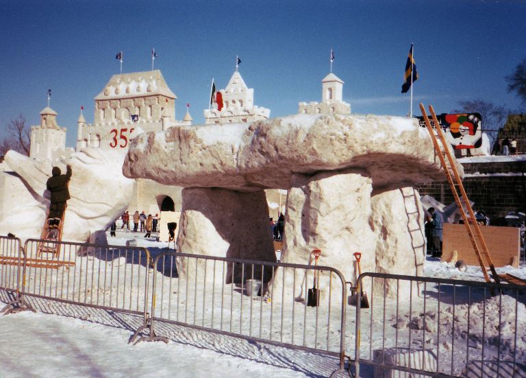 Each year in February, the wonderful city of Québec holds a massive winter carnival, the Carnaval de Québec. Among the many events and festivities is an ice sculpture competition, with entries from around the whole world. 
The year I visited, 1989, amongst all of the various ice carvngs and sculptures, there was a massive ice dolmen, made I believe by some Breton people. I could not of course, 