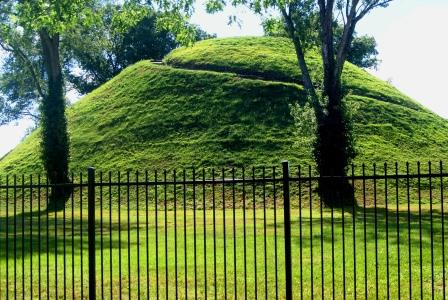 Grave Creek Mound is an example of a burial mound built by the Adena people approximately 2000 years ago.  It was originally 69 feet high and 295 feet in diameter.  There is a good little museum adjacent which allows access to the grounds and provides information on this and other Adena mounts in West Virginia and surrounding area.  When looking for this mound, just go to downtown Moundsville, WV.