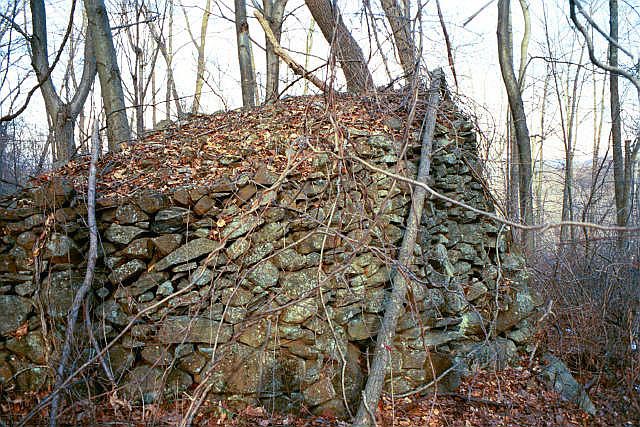 A huge cairn at Oley Hills. Some quartz chunks, which must have been brought up from the valley floor, are incorporated into it on the other side. Note, on the right, the view across the valley to the ridge on the other side, about 15 miles away