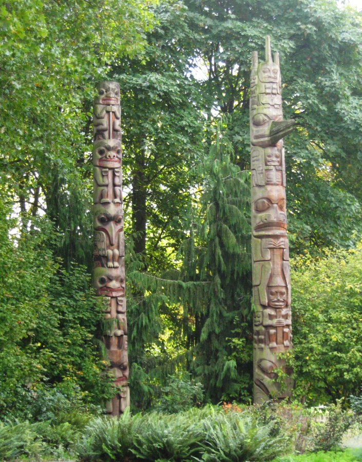 Poles outside the Burke Museum. These carvings may have been done by people from the Salish culture.