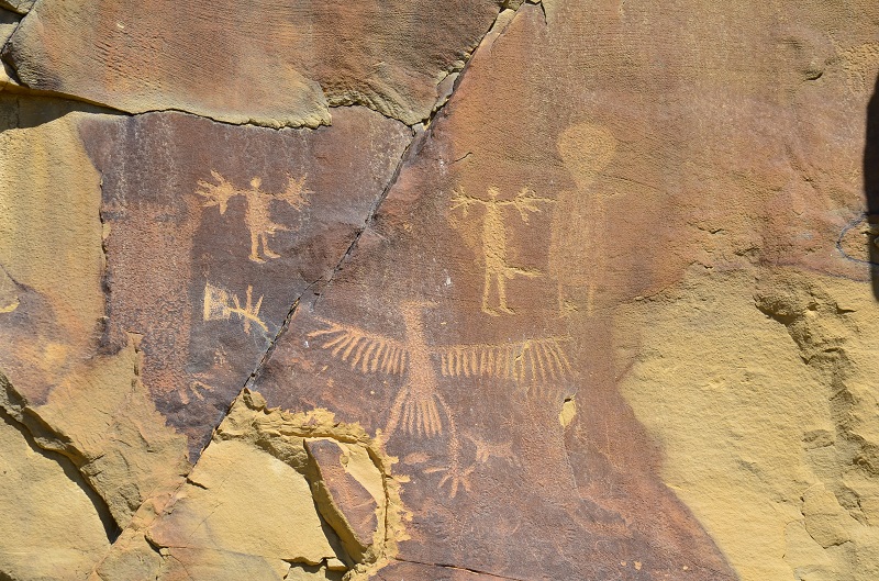 Birds and human-like petroglyphs at Legend Rock.
