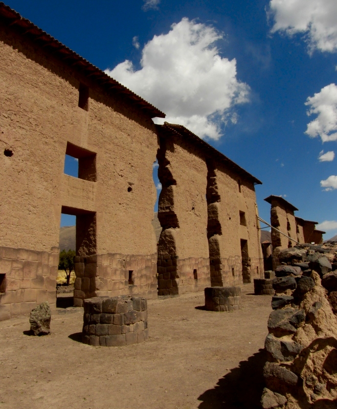 Temple of Viracocha, the Creator god.
This was once a major centre on Inca civilisation and religion.

This photo shows the main ancient temple wall, the lower parts being typical Inca cut and fitted masonry, while the upper section is made of adobe.

The roof tiles are a modern addition, to protect the adobe from rain and erosion.

Photo, Sept 2013
