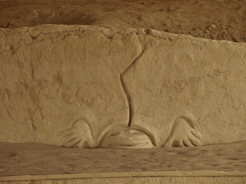 Site in Lima Region, Peru.  
La Hornacinas (The Niches), the principal building in sector A.  A relief thought to be a frog and lightning, possibly symbolizing rebirth.  This is the highest relief art in the building complex and part of the penultimate building phases.
Photo by bat400, Sept 2018.