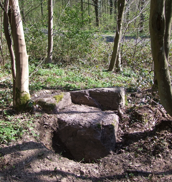 One stone near the edge of the road, showing a peculiar shape.  There are traces of excavations.  April 2015.