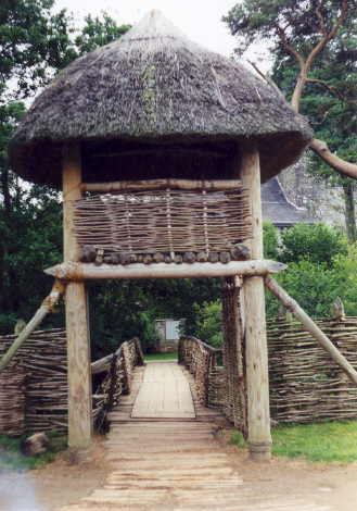 The reconstruction of a bridge joining the 'mainland' to the crannog at Craggaunowen.
(Summer 1999).