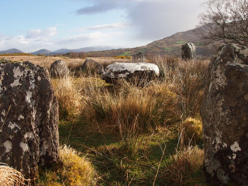 I think that public access is possible. Leave the car where the small pictograph of the Beara tourist trail is. Follow the path about 10 min. After the third or fourth ledder (anyway when you get to the large open pasture), leave the trail to the left.  