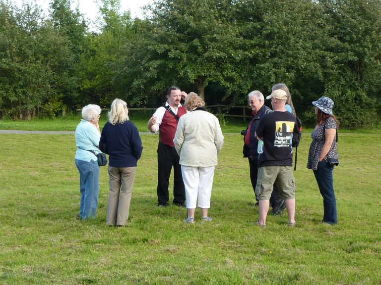 Tim Prevett giving one of his afternoon tours of the henge and nearby barrow. 