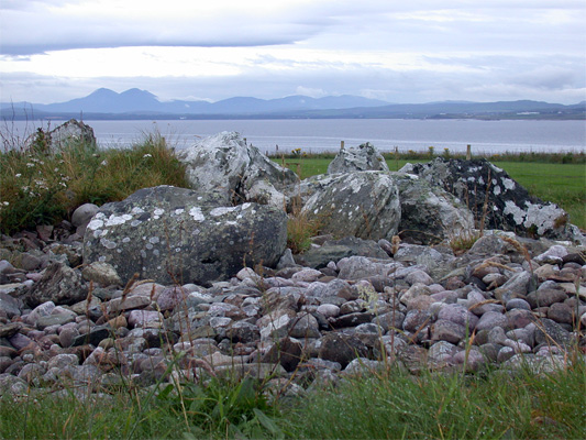 Port Charlotte Chambered Cairn - looking North West over the bay of Loch Indaal to the Paps of Jura
