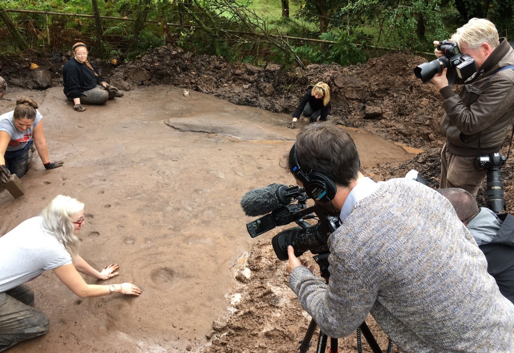 Stony star - the newly uncovered Cochno Stone gets some media attention. Visitors welcome to the 2016 dig, follow the signs in the area

Photo Credit: Dig Cochno stone