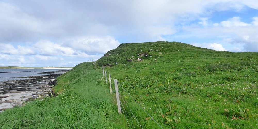 View from north west. This broch is very susceptible to coastal erosion. (13th June 2015).