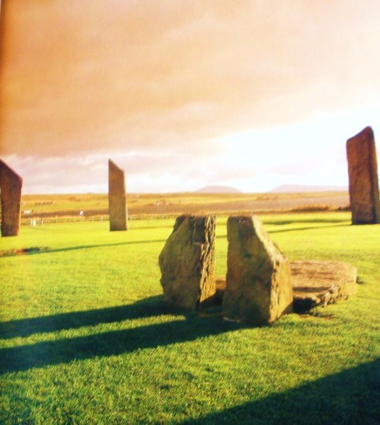 Stenness The Stones of Stenness, Skara Brae.
A view of the two small upright stones and one large flat stone at the centre of the circle - which may have been a cist, though some historians believe it to have been a hearth.
The date of construction is put at 3,000 years ago.