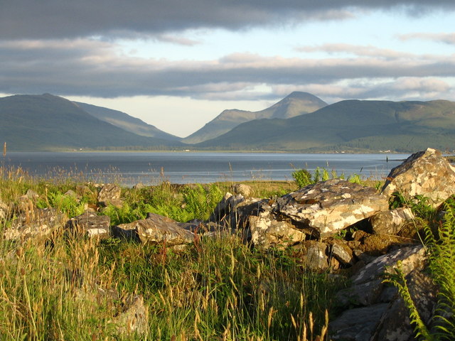 Site in Isle of Mull Scotland

An Sean Chaisteal (the old castle) is an iron age broch, now in a ruinous state with only a few courses of stones visible. They are seen here in the foreground, looking down the Sound of Mull towards Beinn Talaidh in the background

Copyright Ken Craig and licensed for reuse under this Creative Commons Licence.