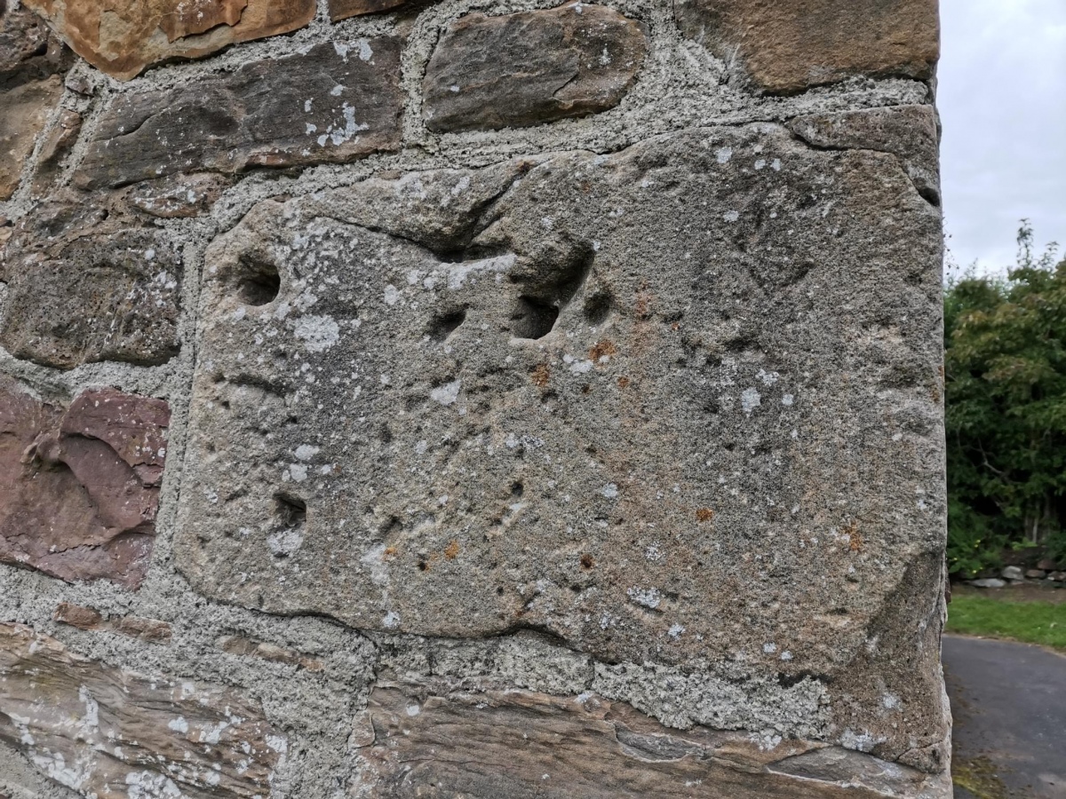 Stone in chapel wall, August 2023