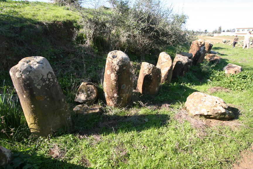 Msoura Msoura, Marocco, became known to the West only after 1830. The Berber people of the Maghreb ascribed the enigmatic megaliths as having been the work of the Djouhalas, pre-Islamic pagan giants, and the Ghouls, ogres and magicians. The ring is formed by a large, despoiled tumulus, and is kerbed by a contiguous, elliptical ring of upright stones.
The southeast sector features an abutting, interna