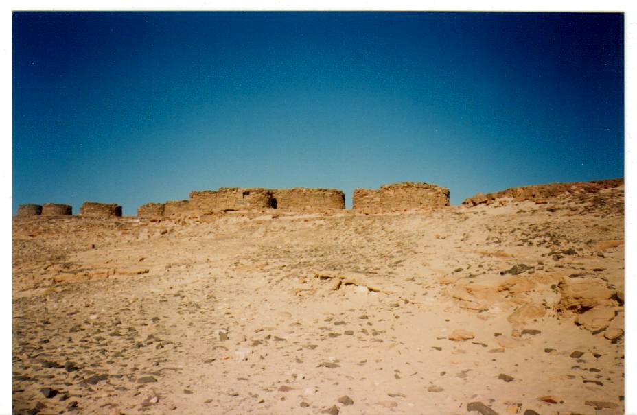 In central south Sinai there old tombs from the 5th millennium BCE.

The Beduin call them NAWAMIS (plu.) and Namus (sing.) by.  The facing West door is built from local sandstone.

According to prof. O. Bar-Yosef pre-dinastic people belived that the soul departed westward to the under world.
All the tombs in the main part of Egypt are on the western of the Nile.

The Nawamis in Southern Sin