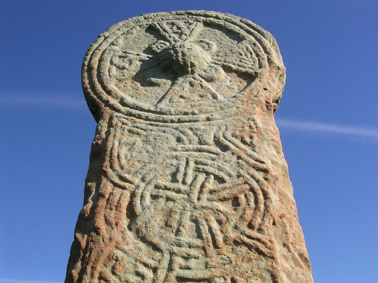 A close up on the top of the SW facing side, showing the prominence of the central boss of the cross.