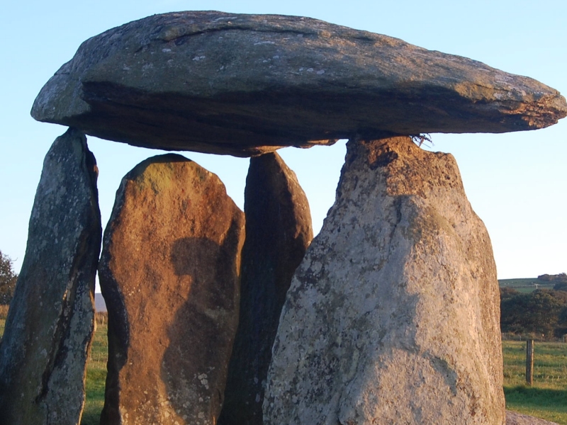 Extraterrestrial visitor to Pentre Ifan?
I was sorting through some photos of a visit in Sept 2010, when I noticed one with an intriguing shadow...look familiar to anyone?

This wasn't set up - I think I must have just taken a shot quickly before the other person who had arrived came into shot...