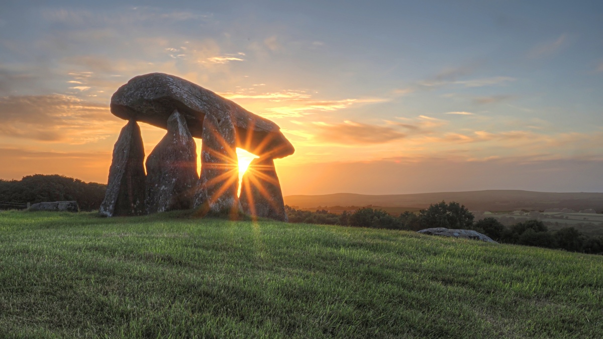 A year later and back at Pentre Ifan for the solstice sunset, all on my own some (apart from a 13yr old Jack Russell this time) I Was expecting at least to see one other (person not Jack Russell) at this site for the sunset. 
That morning I'd gone to see the sunrise at Gors Fawr stone circle and even left my house in the rain knowing there was zero chance of seeing a sunrise, I definitely was not