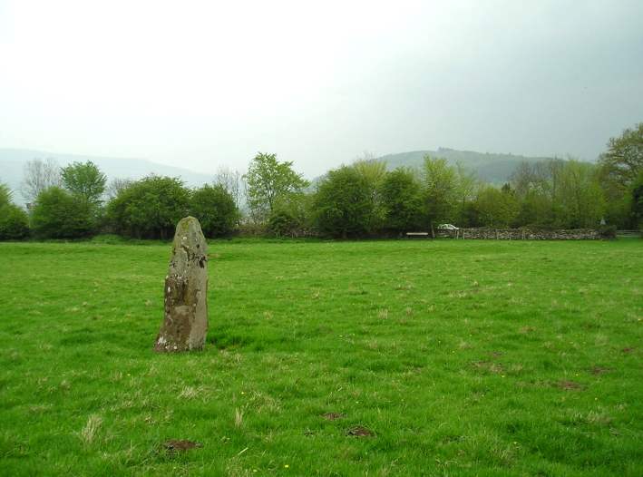 Bwlch Standing Stone in Powys, SO150219

At Bwlch, the A40 makes a large hairpin bend to get up the hillside. In the field which is largely surrounded by this road is this Standing Stone, which is about 2 metres tall.