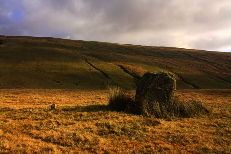 Maen Mawr and it's two outliers . These type of stone row, with a large slab and the much smaller companion/s can be found in several places in the Brecon Beacons, not so common elsewhere.
  The thinking behind them is a mystery now, but these ones at least may be showing some clue to their use here.
  It is a little after midday on November 7th, and the shadow from Maen Mawr has just passed ove